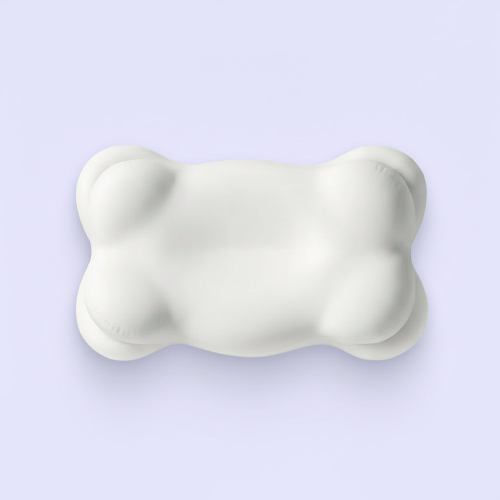 Sleep pillow with 6-zone support features on a light purple background