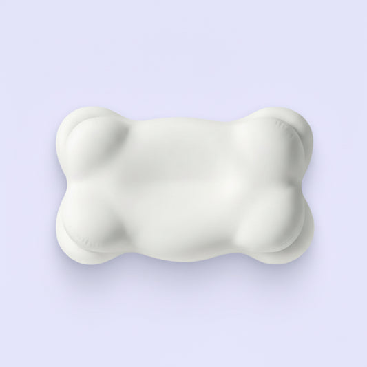 Sleep pillow with 6-zone support features on a light purple background